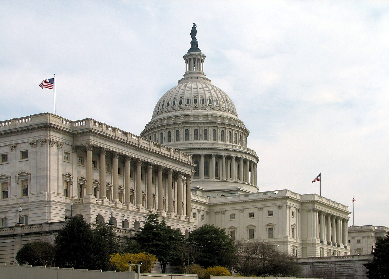 U.S. Capitol Senate wing exterior, Washington, D.C. — archival still by Scrumshus / Wikimedia Commons (public domain). Not vote day.